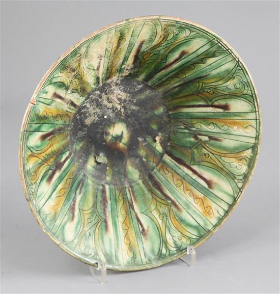 A Chinese sancai glazed conical bowl, Tang dynasty, diameter 24cm, repaired